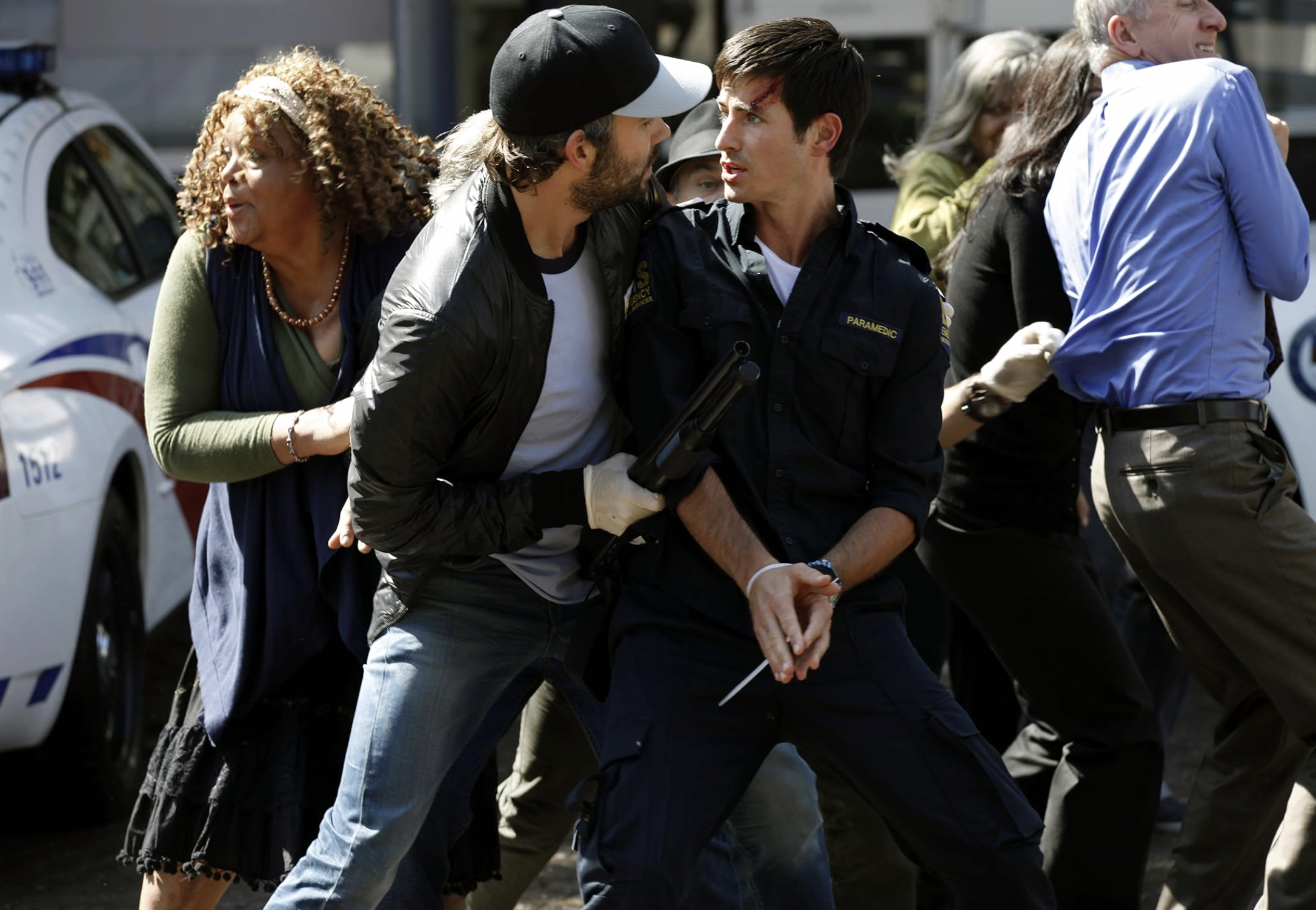Craig Olejnik filming an action scene as a paramedic